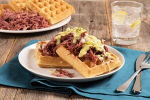 WAFFLES WITH CORNED BEEF AND DILL PICKLE HOLLANDAISE SAUCE Image